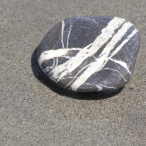 Single pebble on a beach
