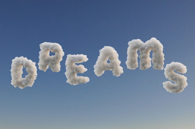 dream spelled out in clouds